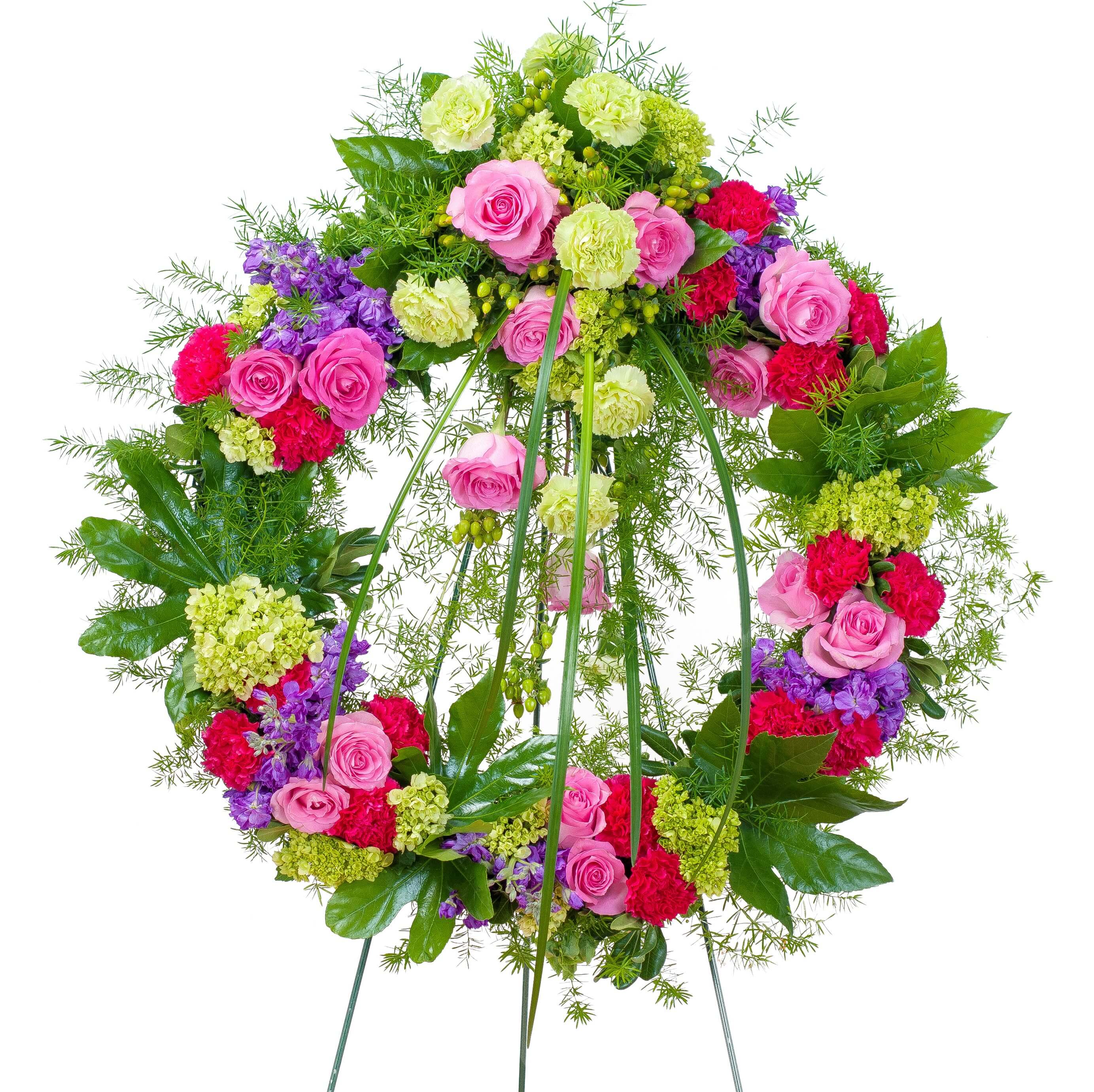 Forever Cherished Wreath - This beautiful wreath with a combination of pink and purple flowers will show that      they will be forever cherished.