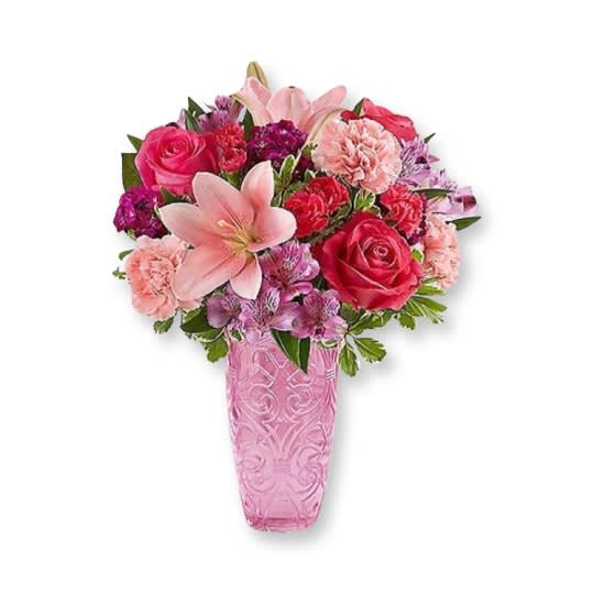 Sweetheart Medley - Bright arrangement of hot pink roses, asiatic lilies, carnations, and more. Artfully hand-designed inside a specialty glass vase, it’s a lovely surprise sure to delight your sweetheart! 
