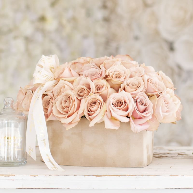 Nude roses  - Bring beauty to the table with elegant arrangement, presented in a heart shaped box. This arrangement features roses all around   Due to the seasonality of flowers or supply chain issues, substitutions may occasionally need to be made. While we understand this is an inconvenience, we will fill your order with an arrangement of similar color and design style.