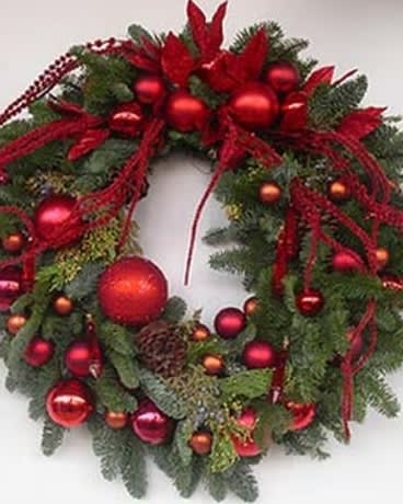 Sleigh Ride Sleigh Ride - Stunning holiday wreath for the red lover. Fragrant noble fir with touches of juniper berries, pine cones and all over red ornaments