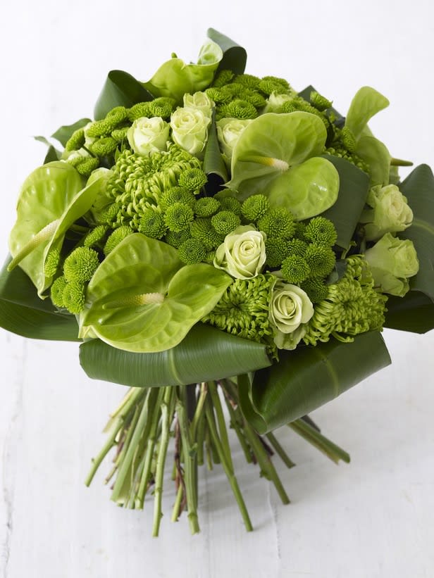 Evergreen Elegance: All-Green Flower Arrangement - &quot;Evergreen Elegance&quot; is a sophisticated and calming floral arrangement that embraces the beauty of lush greenery. This all-green bouquet combines a variety of foliage and blooms in different shades of green, creating a harmonious display that exudes tranquility, freshness, and a connection to nature. Join us as we explore the enchanting world of &quot;Evergreen Elegance,&quot; where every leaf and petal contributes to a serene symphony of green hues.  Varieties and colors of flowers may vary according to season and availability. This arrangement includes a newly cleaned vase and good quality water &amp; flower food.  Item: 1726  Care Instructions: For the best vase life, change the water every two days.  