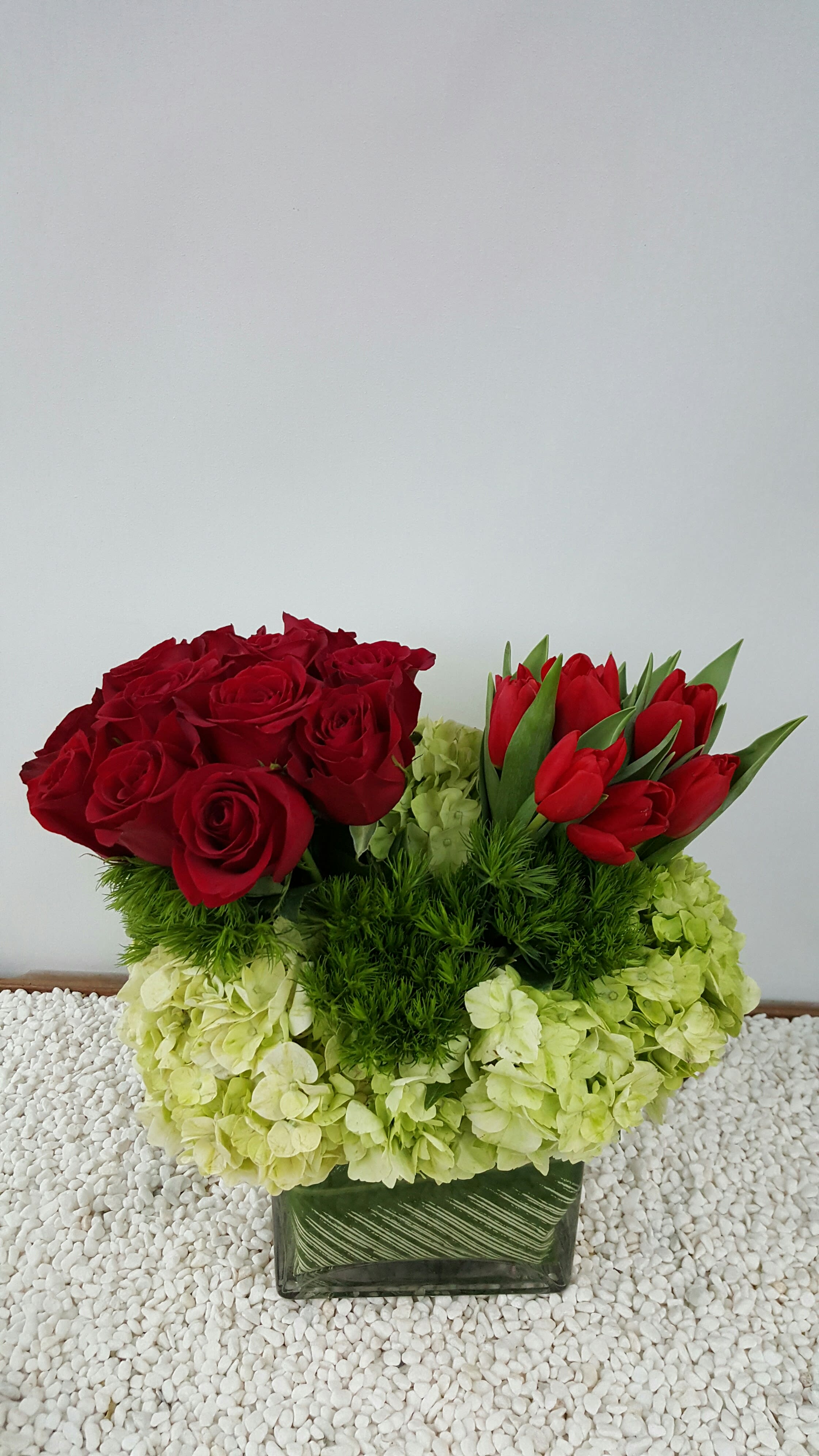 Abundantly Yours Love Square: A Blossoming Tribute to Overflowing Affection - Experience the magnificence of abundant love with the &quot;Abundantly Yours Love Square Flower Arrangement.&quot; Designed in a square format, this arrangement is a visual embodiment of love's vastness and the overflowing emotions that come with it. Through a harmonious blend of exquisite blooms, this arrangement encapsulates the boundless affection that knows no limits.  Varieties and colors of flowers may vary according to season and availability.  Item: 123  Care Instructions: For the best vase life, change the water every two days.  
