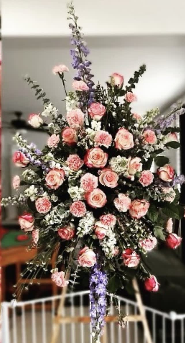 Roses and mixed spring flowers Roses and mixed spring flowers - Funeral spray