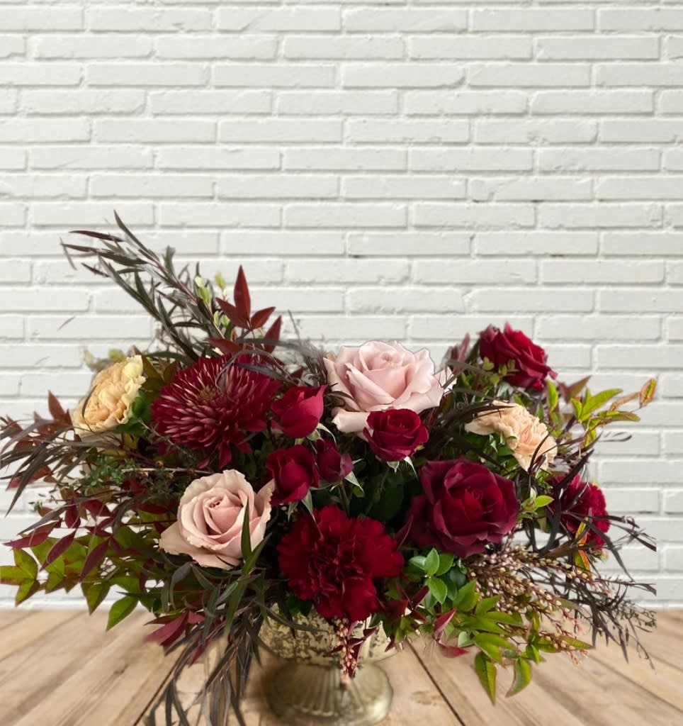 Victorian Antiques Victorian Antiques - A stunning moody maroon and antique pink flower arrangement in a gold compote.