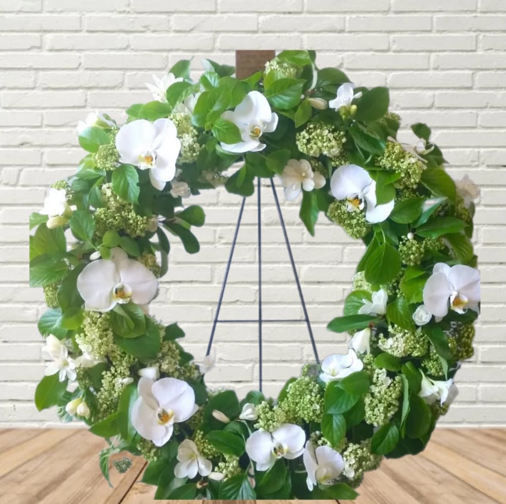Have a Talk with God Wreath Have a Talk with God Wreath - Lush greens with white and green blooms create the best background for elegant Phalaenopsis Blooms in this stunning floral wreath.