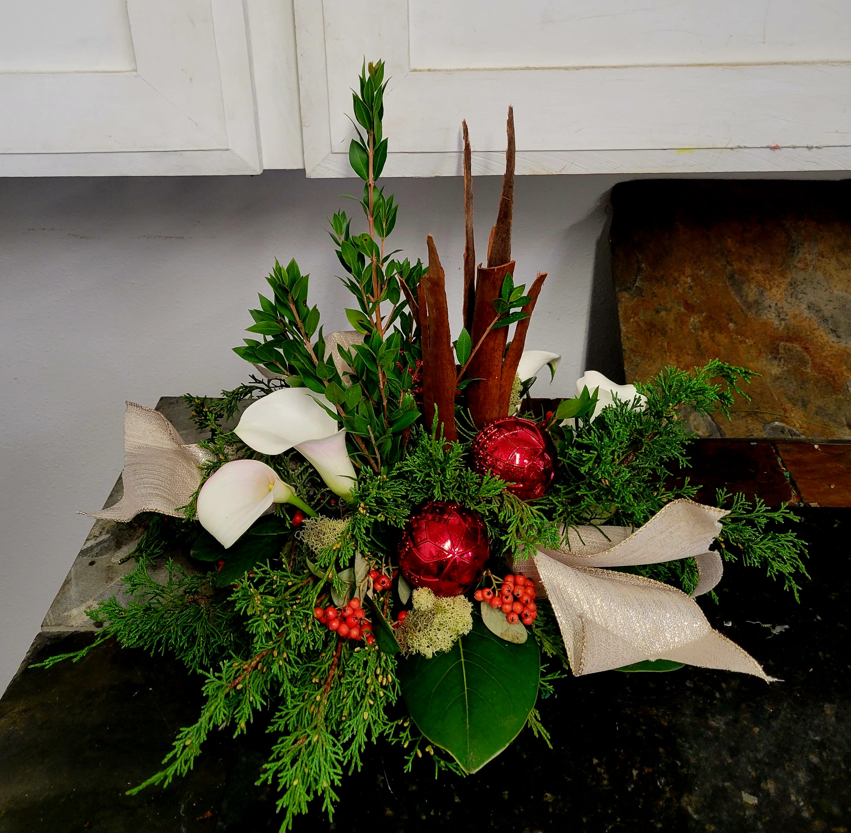 Christmas Folly - What I love about this gift is the detail I added to give your loved one that special holiday feeling.   Calas may change to roses, but the feel will definitely remain the same.  Thank you!  Joe owner/designer