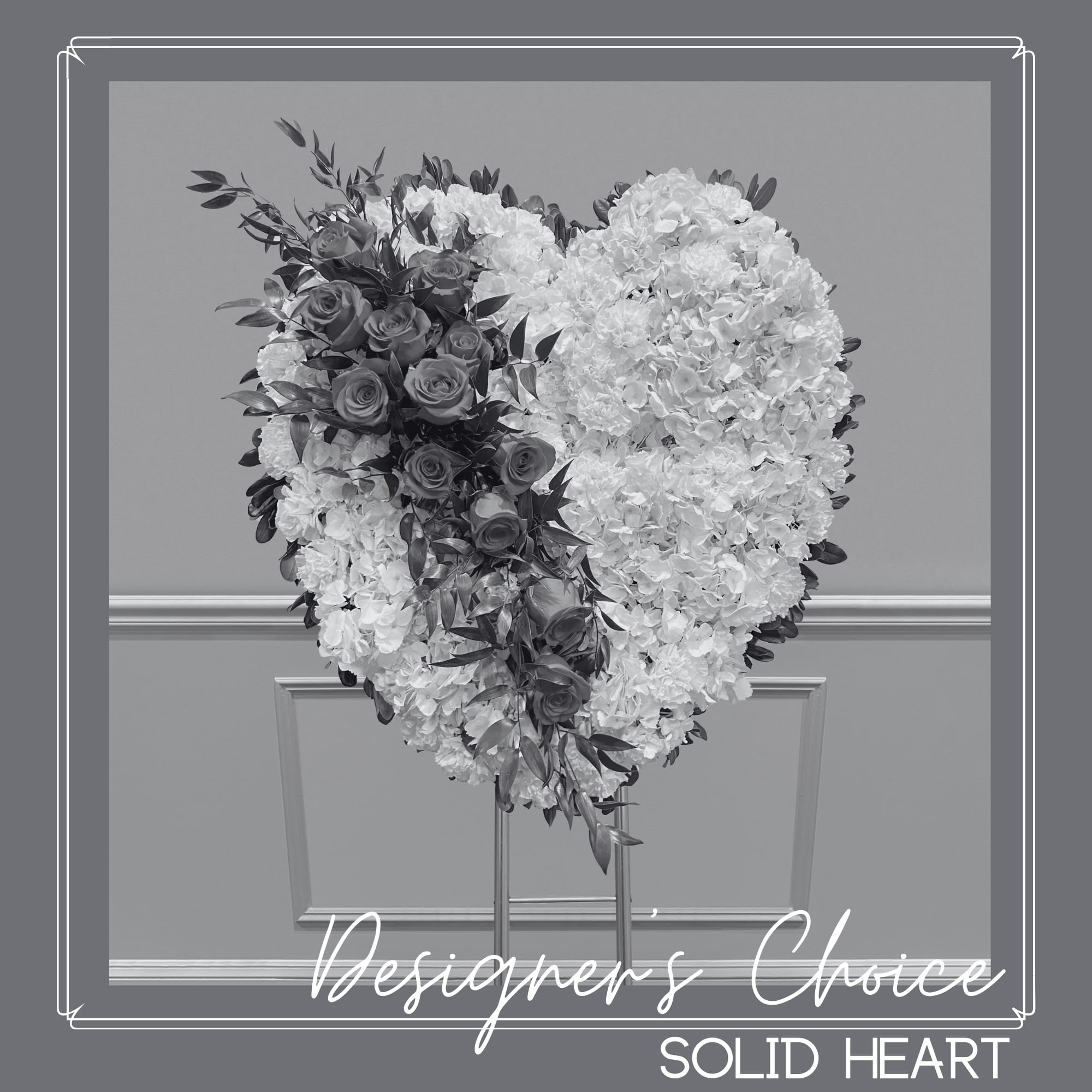 Solid Heart - Designer's Choice  - All white flower heart with a spray of roses through the center. 