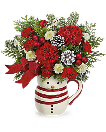 Snowman Christmas delight Snowman Christmas delight - Red and green flowers with assorted evergreens in an adorable snowman container