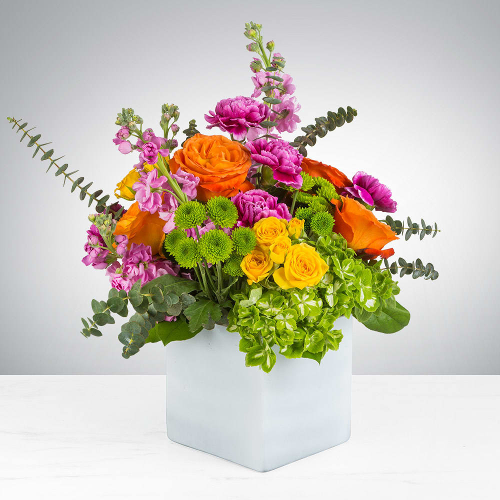Va Va Bloom  - Turn up the heat with the vivacious bouquet. This arrangement includes roses, carnations, stock, and hydrangea. This is the perfect gift for someone's birthday or any celebratory occasion.