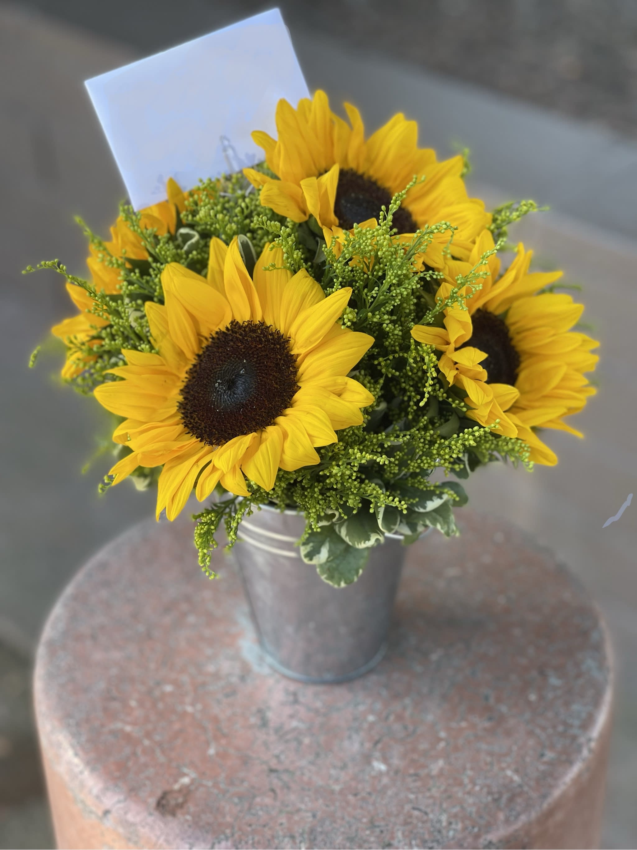 Can of Sunshine - Blooming sunflowers and lemon tip nestled in a rustic tin can will brighten up anyone's day. 