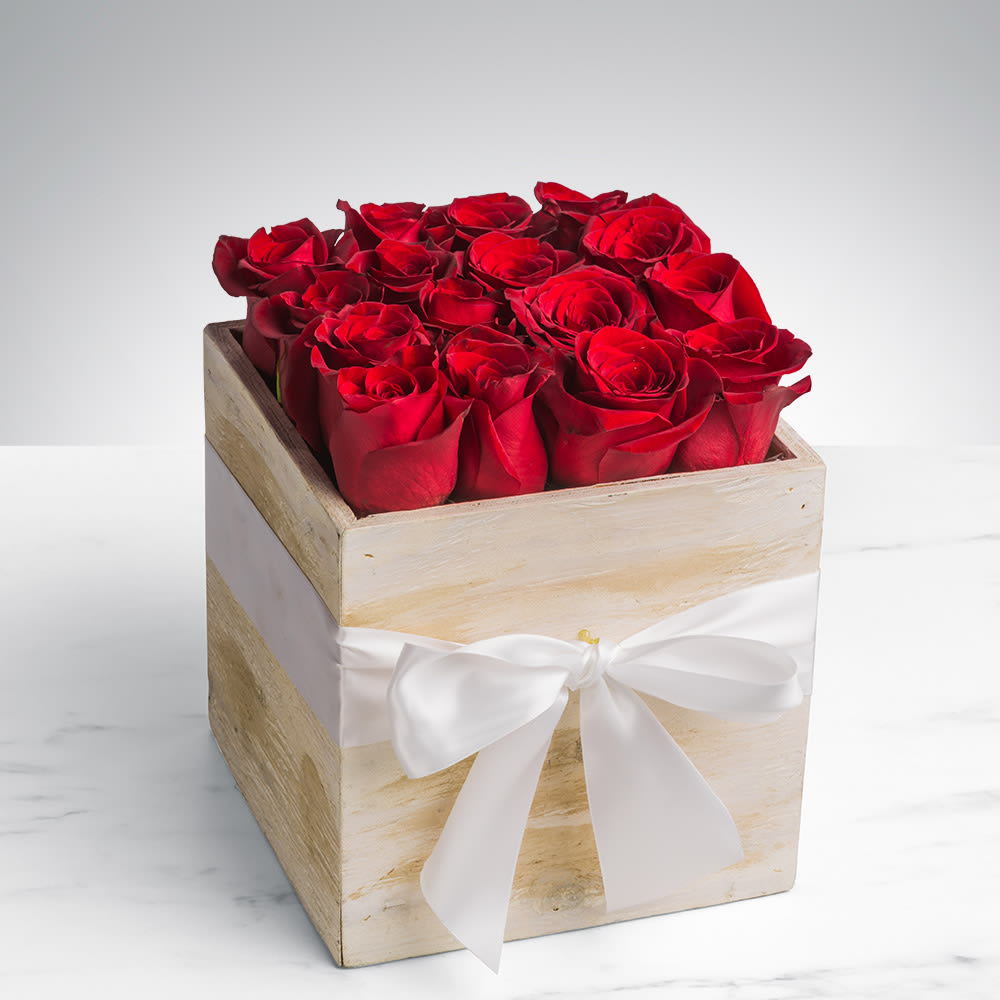 Rustic Rose by BloomNation™ - This eye-catching arrangement offers a modern twist on the classic dozen. Rustic Rose by BloomNation™ makes a great gift for Valentine's Day, a birthday, or just to let someone know you're thinking of them.  Arrangement Details: 16 Red Roses in a Wooden Box APPROXIMATE DIMENSIONS: 11&quot; H X 8&quot; L X 8&quot;W