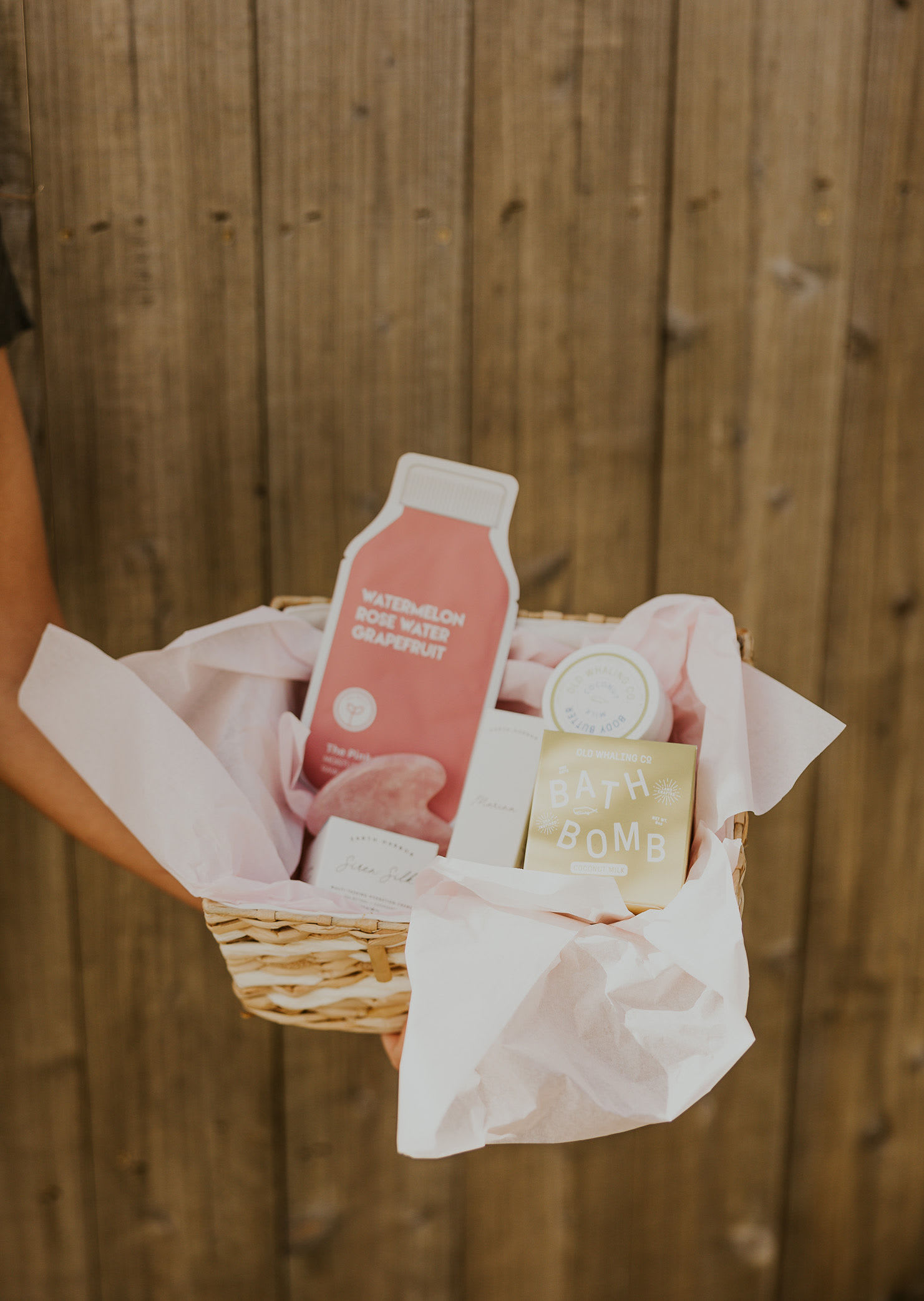 Spa Gift Box - Who doesn't want a spa day? This special gift box includes a face mask, Earth Harbor - Calypso Rejuvenating Moisture Elixir, Three Ships - Glow pore minimizer, a bath bomb, candle and hand +  body cream.   You can go above and beyond and upgrade to include a $65 designers pick flower arrangement