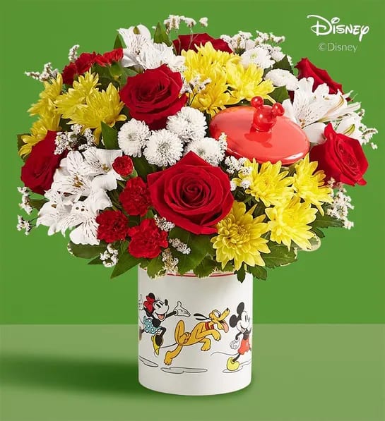 Disney Mickey Mouse &amp; Friends Cookie Jar - Classic - EXCLUSIVE Share a gift full of character(s)! Part of our new Disney collection, our handcrafted bouquet is gathered in classic colors and designed in our whimsical Mickey Mouse and Friends cookie jar, featuring iconic animations. Great as a keepsake container or to keep your favorite treats, it’s a sweet and nostalgic surprise for every Disney fan.