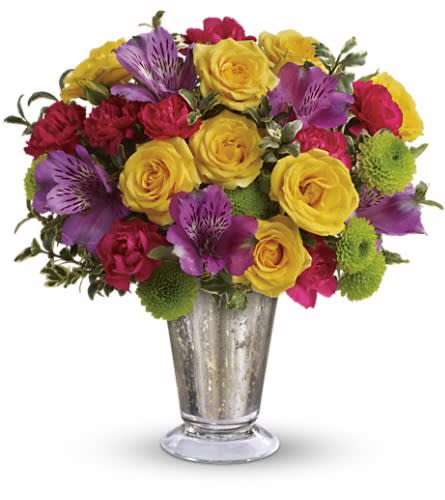 Teleflora's Fancy That Bouquet - A timeless Mercury Glass vase lends a fancy flourish to this uplifting bouquet. Yellow roses and miniature hot pink carnations are just the way to pop up her day! Includes yellow roses purple alstroemeria miniature hot pink carnations green button spray chrysanthemums and fresh oregonia. Delivered in a Mercury Glass small julep.Approximately 10&quot; W x 10 1/2&quot; H Orientation: One-Sided As Shown : TEV31-6ADeluxe : TEV31-6BPremium : TEV31-6C