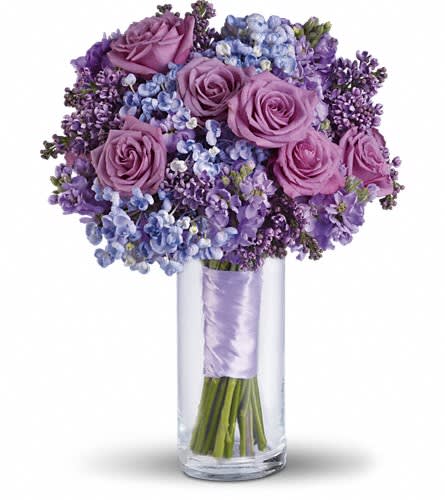 Lavender Heaven Bouquet - Fall in love with this lavender bouquet and its luscious mix of texture and fragrance. Lavender lilacs roses and stock contrast beautifully with blue stems of popcorn hydrangea.Approximately 11 1/2&quot; W x 15&quot; H Orientation: N/A As Shown : T194-6A