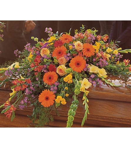 Summer Sentiments Casket Spray - Express your warmest sentiments with this colorful spray of summer's brightest blooms. Each casket spray is decorated with red carnations yellow gladioli orange gerberas purple Monte Cassino asters and roses with soft foliages.Approximately 51&quot; W x 38&quot; H Orientation: All-Around As Shown : TF203-2