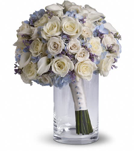 Lady Grace Bouquet - Full of classic charm this country-inspired bouquet features delicate limonium among light blue hydrangea white roses and mini callas. Lavender limonium light blue hydrangea white roses and miniature callas.Approximately 11 1/2&quot; W x 14 1/2&quot; H Orientation: N/A As Shown : T183-1A