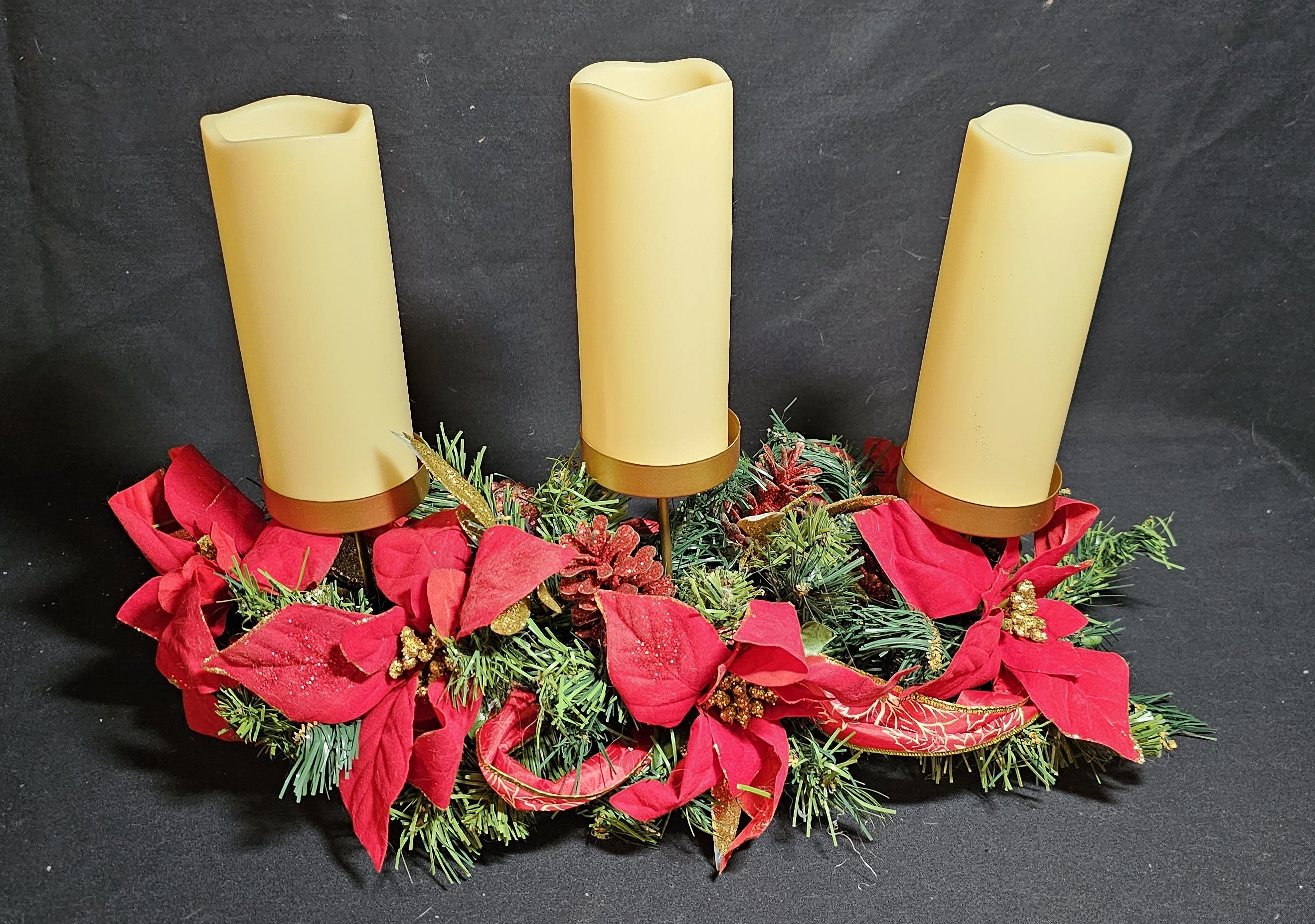 Tri-Peak Candles - Classic center piece with poinsettia leaves and three medium size artificial candles