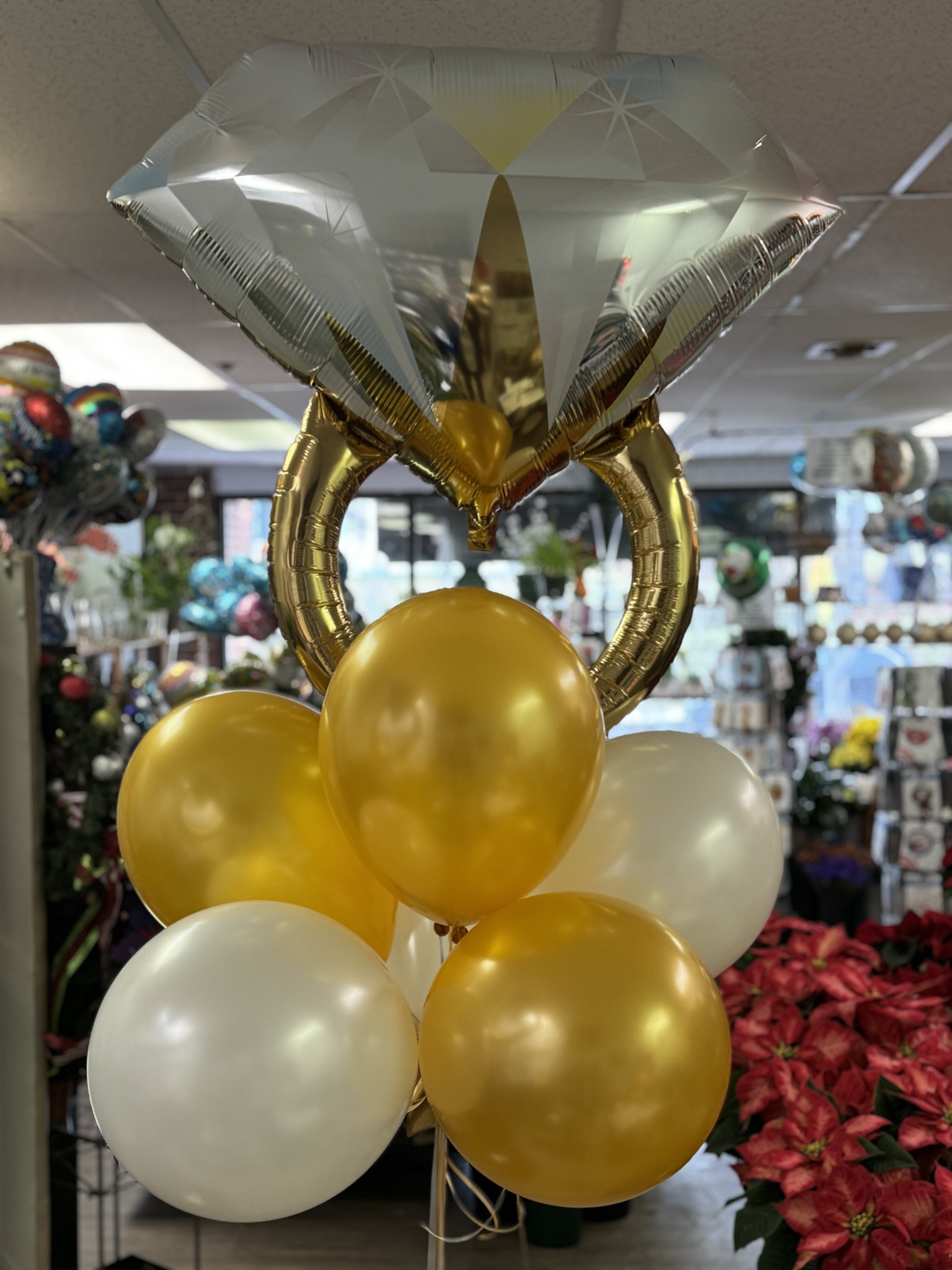 Marry Me? Diamond Ring Balloon Bouquet - Want them to say “I DO!”? Send this engagement ring balloon bouquet to get your answer! These are great for decorating for your special occasion! Local delivery or pick up only. 
