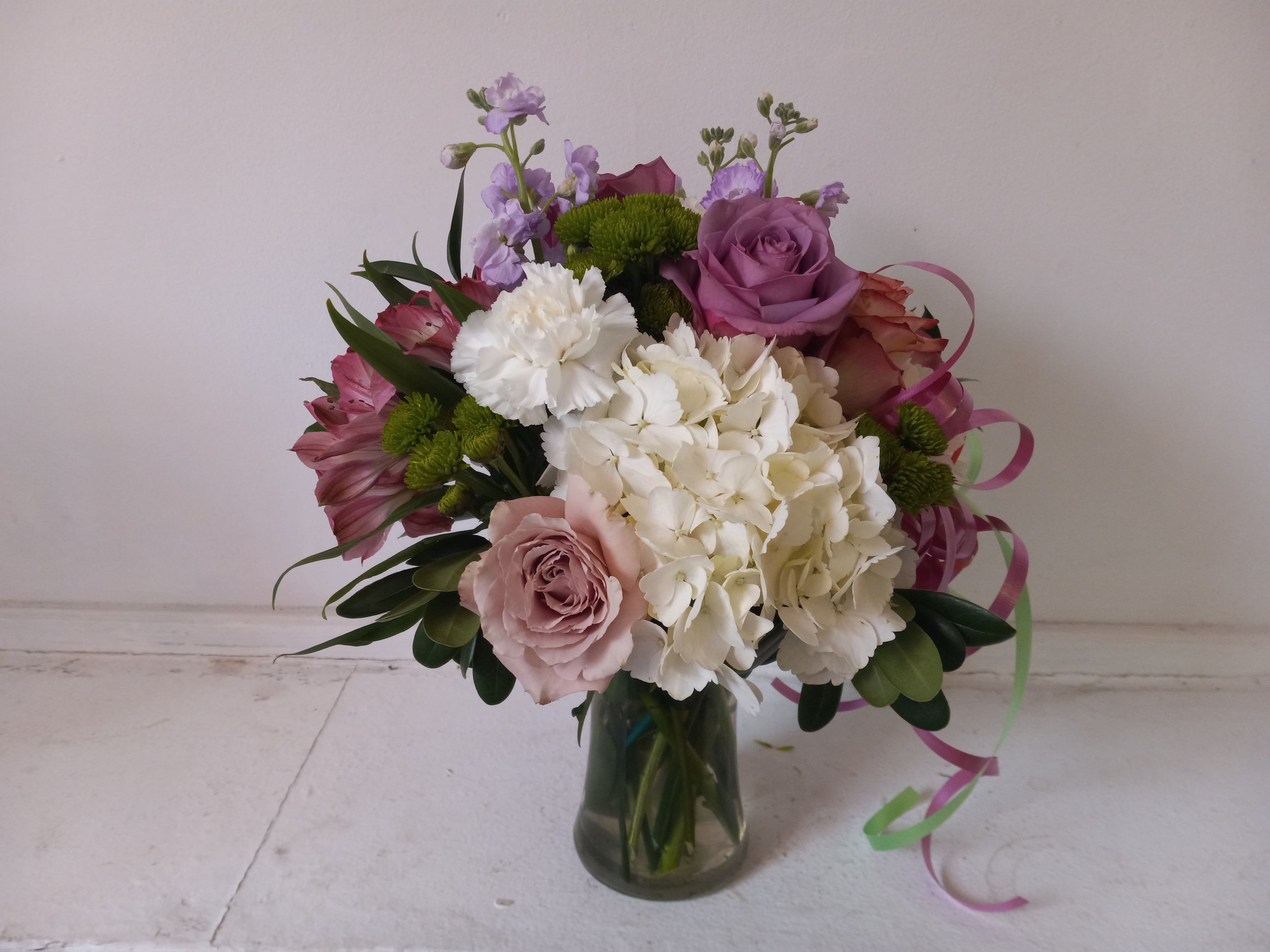 Pretty in purple - Light purple tone roses bland in with white and cream flowers