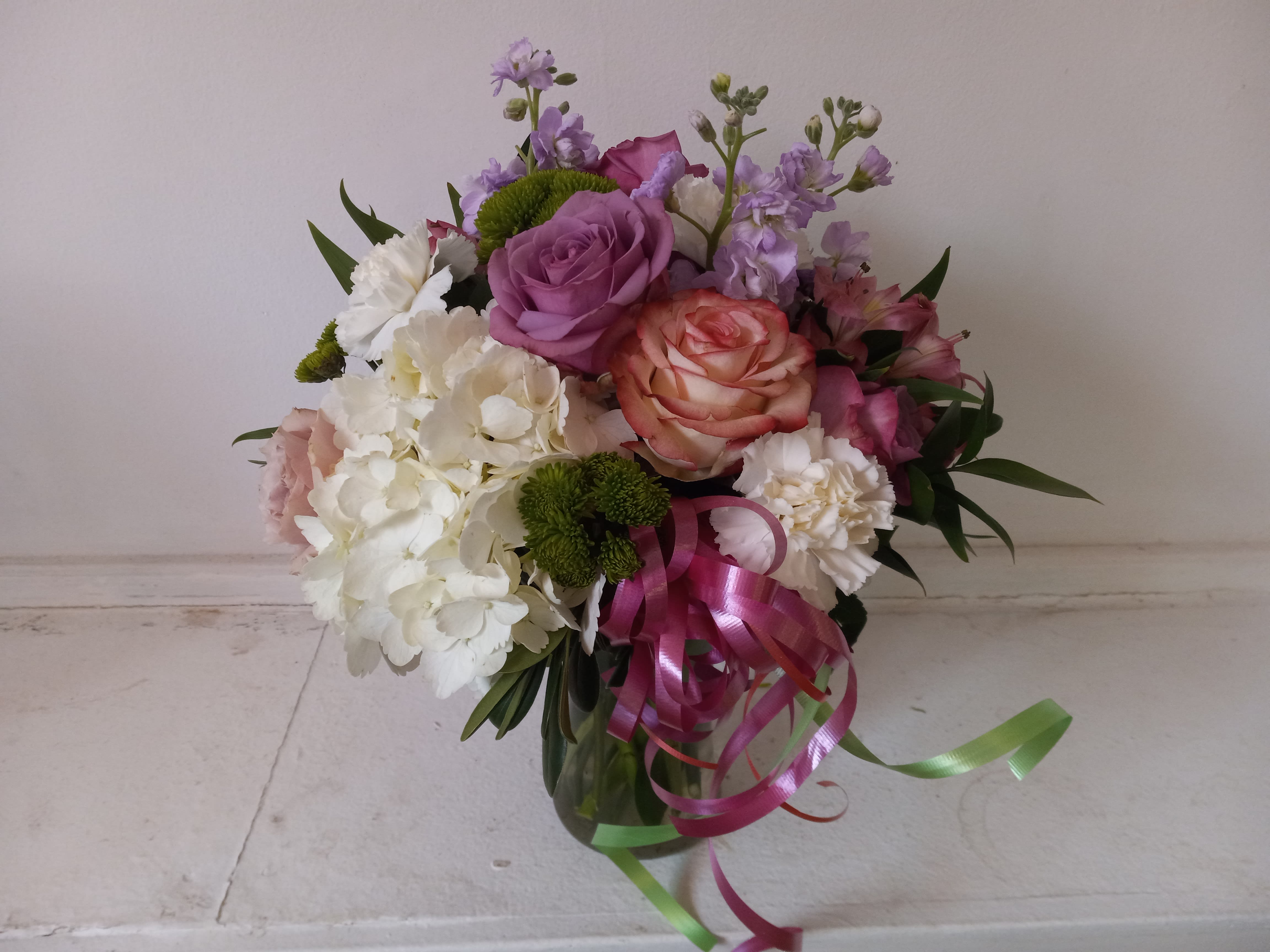 Foxy - Fresh happy mix of pastels in a vase