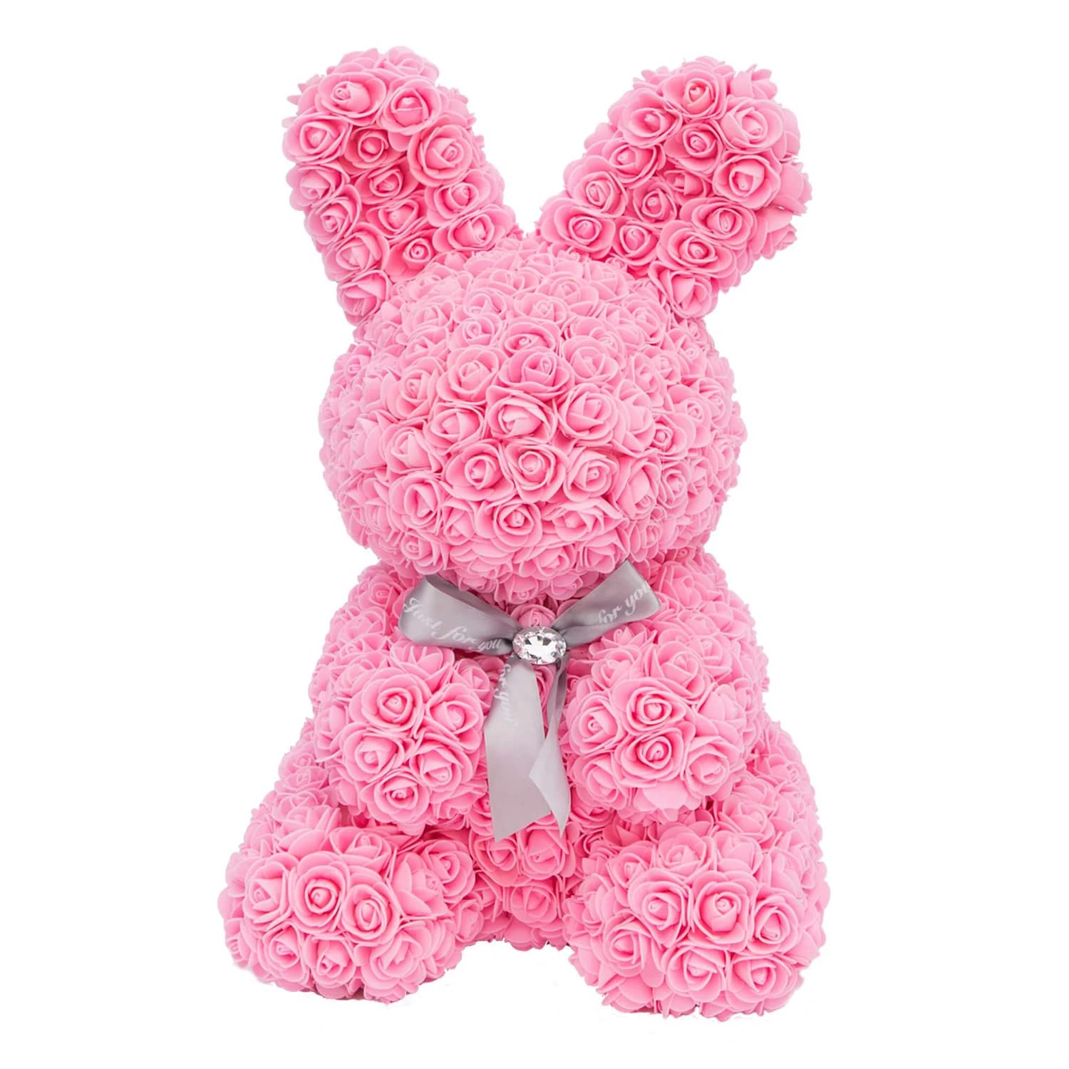 Standing foam Pink Rose Bunny  - A &quot;Standing Foam Pink Rose Bunny&quot; is a delightful and creative gift, often crafted with care and precision. Description: The Standing Foam Pink Rose Bunny is a charming creation made from artificial foam roses arranged to form the shape of a bunny. The use of pink roses adds a soft and feminine touch to this whimsical design. The bunny is usually crafted to stand on its own, making it a delightful and lasting decorative piece. This unique item is not only visually appealing but also serves as a thoughtful and enduring gift for various occasions.  Styrofoam bunny covered in faux roses.  Comes with a satin bow.  Available in 14&quot; height.