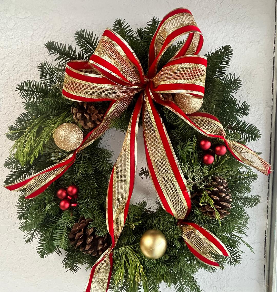 CFH106 - A fresh wreath decorated for the Holidays.