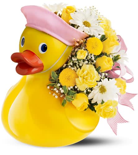 Teleflora's Just Ducky Bouquet - Girl - Bright flowers delivered in an adorable ceramic duck wearing a little pink cap - what a sweet way to welcome the new baby girl into the world. Her parents will love it too. Spray roses chrysanthemums miniature carnations gypsophila and oregonia arrive in a ceramic duck wearing a pink sailor hat. Ducky measures 8.25? H x 7? W x 8.5? L Orientation: All-Around As Shown : TFWEB563
