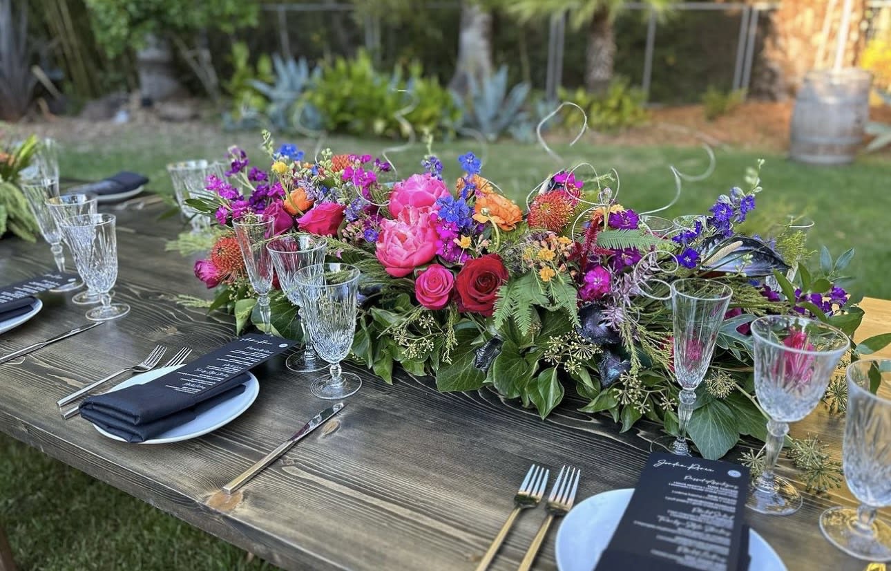 The Fancy Event Box Arrangement The Fancy Event Box Arrangement - This 24" box or landscape piece is perfectly filled with locally grown florals and greenery along with specialty florals to make your event shine!!!