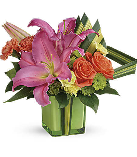 Teleflora's Color Me Cute Bouquet Teleflora's Color Me Cute Bouquet - Cute, colorful and carefully curated, this artistic arrangement of hot pink lilies, orange roses and dramatic hala leaves is a tropically-inspired treat they'll adore!