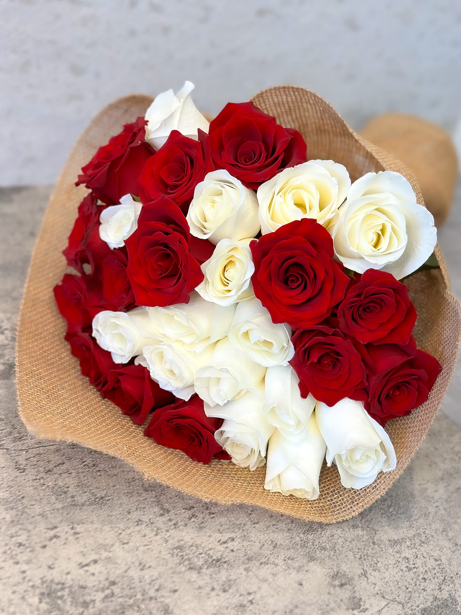 24 Red White Roses Bouquet - Standard - Your order will be arranged approximately as shown on our website