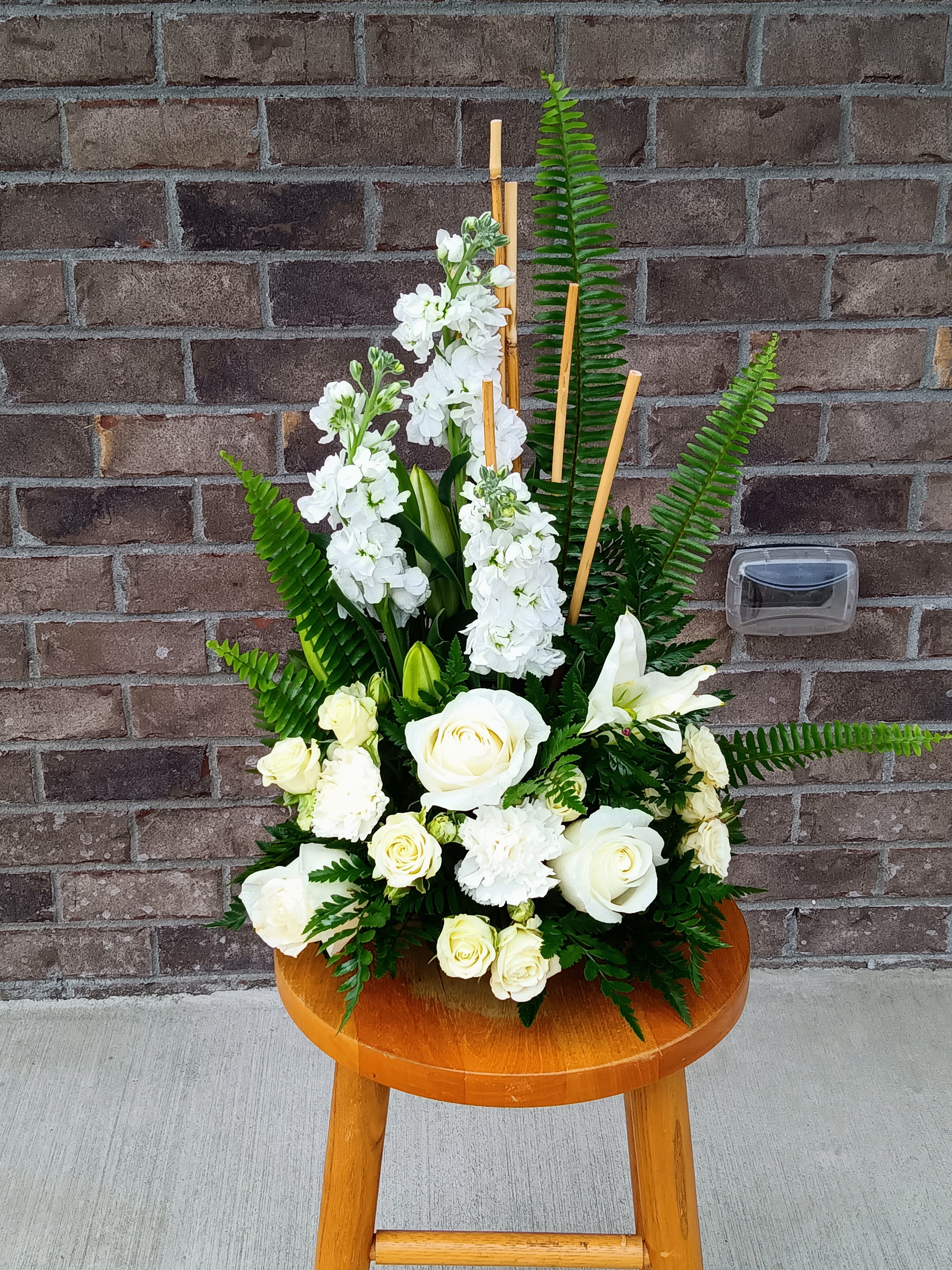 Heaven's Hope - An all-white arrangement filled with various blooms.