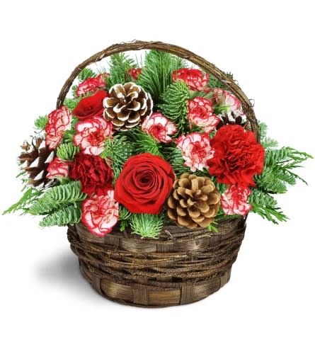 Pretty Peppermint Pretty Peppermint - It’s the most wonderful time of the year! Kick it off in style with this celebratory Christmas basket. Fun, festive, and oh-so-pepperminty, this display will have you on everyone’s nice list. A bounty of assorted pines is arranged with white-tipped pinecones and adorable peppermint mini carnations.