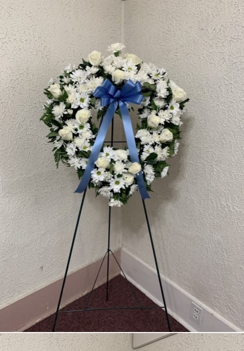 Blue &amp; White Heart Standing Spray - Spray has roses, carnations, spray roses, dasies and greenery