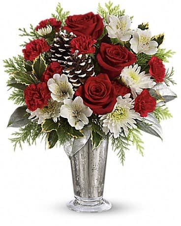 Teleflora's Timeless Cheer Bouquet - Celebrate winter in style with vintage mercury glass and a timeless red rose and winter greens bouquet for an absolutely elegant gift! Beautiful red roses, white alstroemeria, miniature red carnations and white cushion chrysanthemums are arranged with variegated holly, flat cedar, silver lemon leaf and frosted pinecones. Delivered in an exclusive silver Mercury Glass large julep vase.