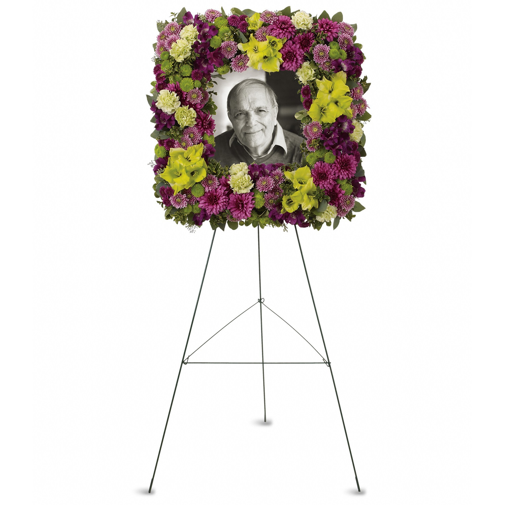 Mosaic of Memories Square Easel Wreath - A unique and lovely tribute for the service, this contemporary square easel wreath of purple and green flowers is a gift of caring expressed with beauty and style. 