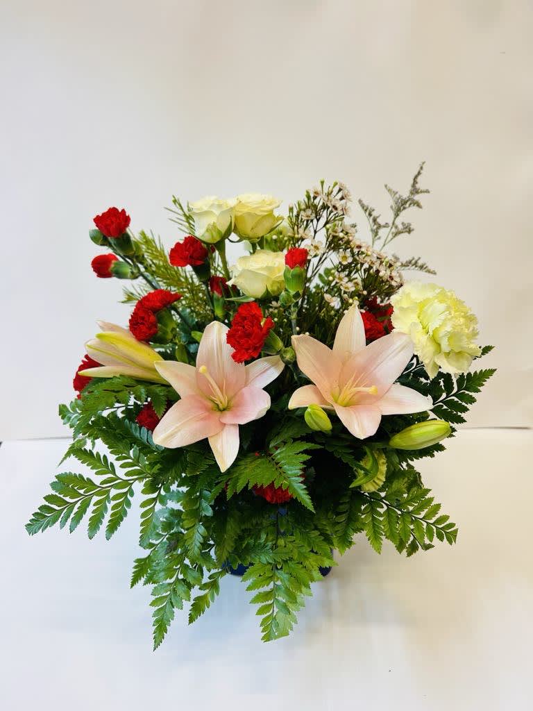 Brighten The Day Brighten The Day - Perfect for any occasion, this beautiful arrangement will have them feeling extra appreciated.