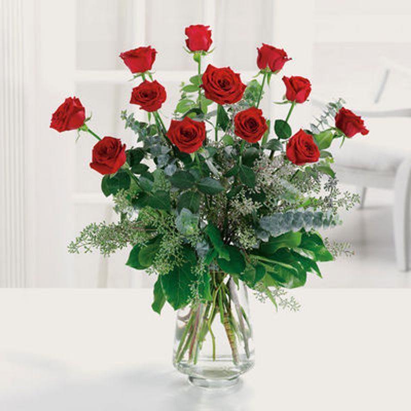 The Perfect Dozen - A dozen red roses are always perfect, always savored. We add even more charming beauty with seeded eucalyptus, spiral eucalyptus and salal. Product ID: 1377 