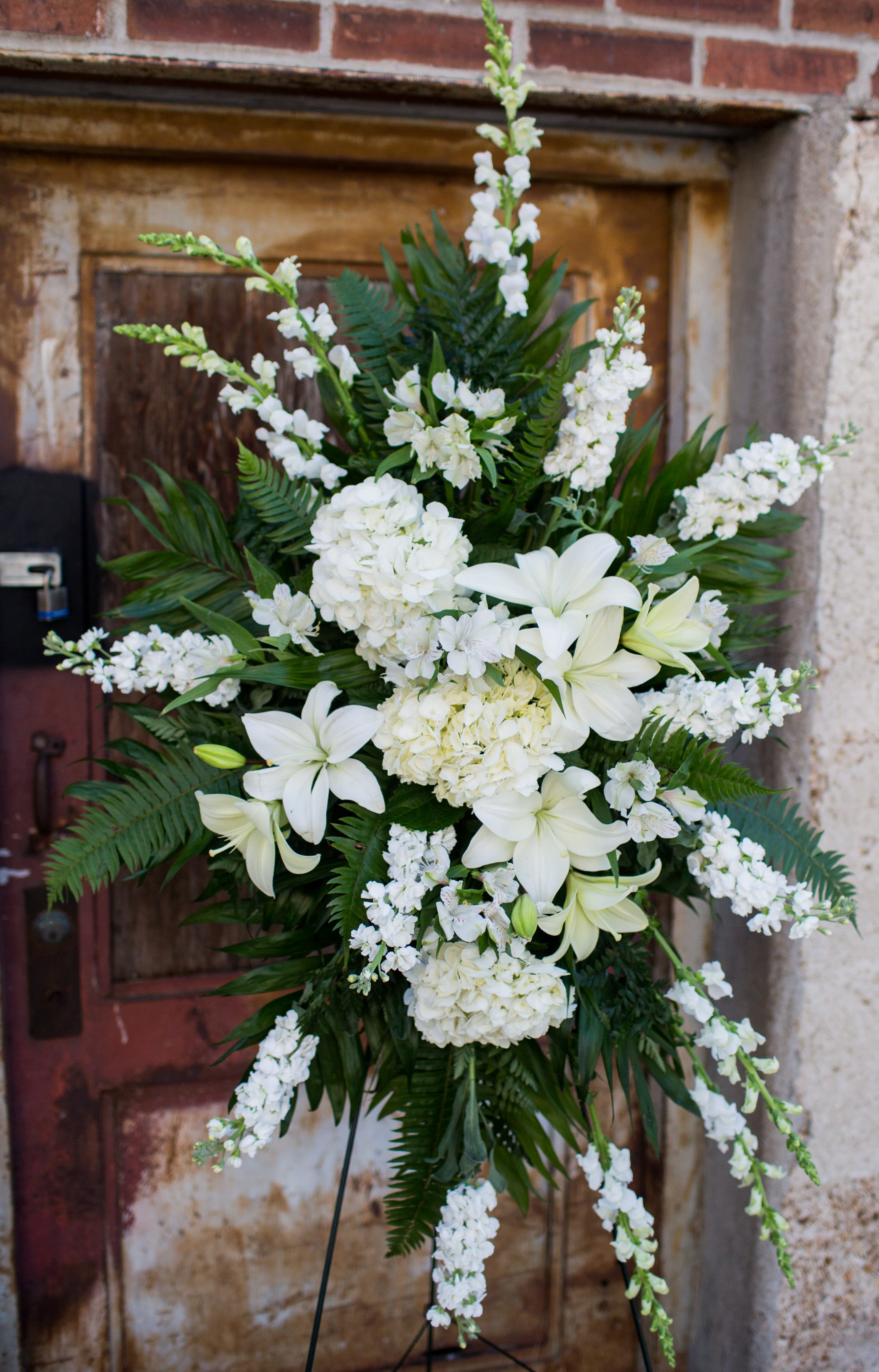 Pure Remembrance  - Pure Remembrance Standing Spray. This spray is all white with Hydrangeas, Snapdragons, Lilies and Alstromerias. Approximately 6 feet tall. 