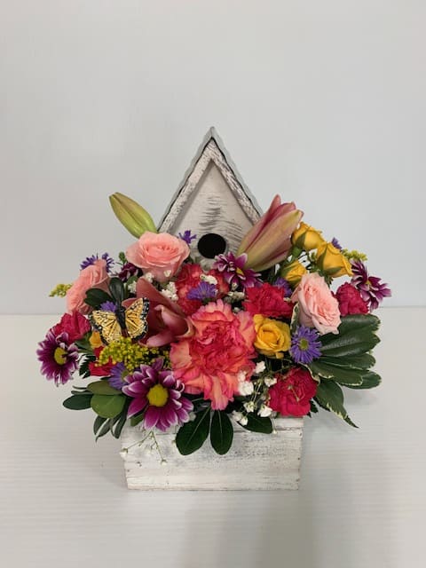 Birdhouse Arrangement - Colorful arrangement in a darling birdhouse, with roses, carnations, alstro, and stock