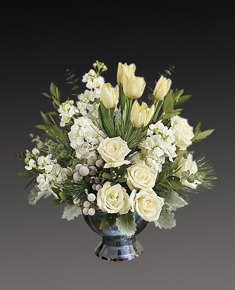 Winter celebration - A stylish pop of winter style, this snow-white bouquet in a silver floral container dress up any occasion!