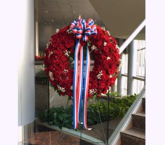 FIVE HUNDRED SPRAY ROSE WREATH WITH BOW [TT-ANC45] - 24&quot; DIAMETER WREATH ON EASEL      As Shown : TT-ANC45 