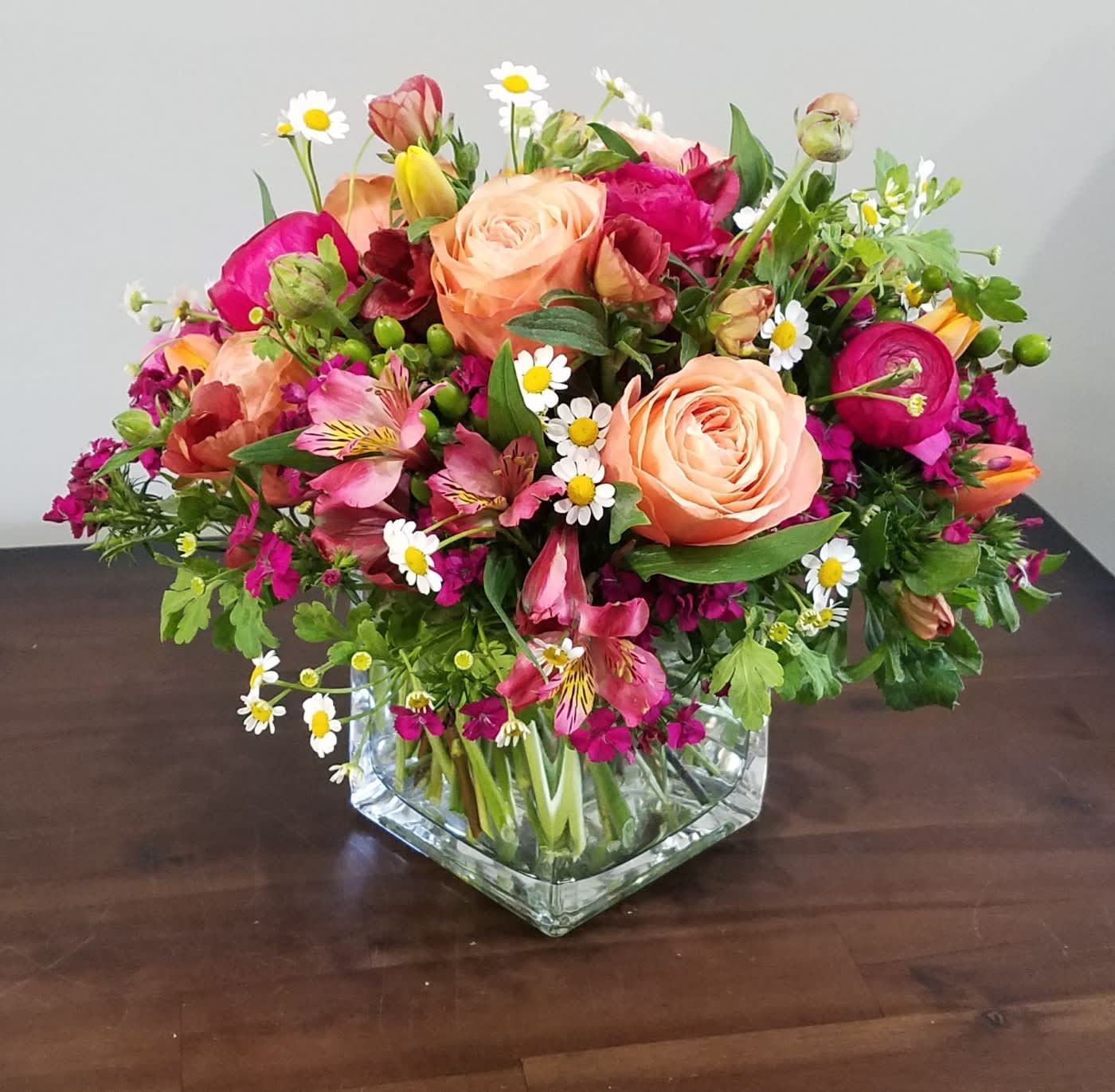 Think Pink Think Pink - The perfect desk or small table posey, roses, Ranunculus, Alstroemeria, feverfew and Sweet William
