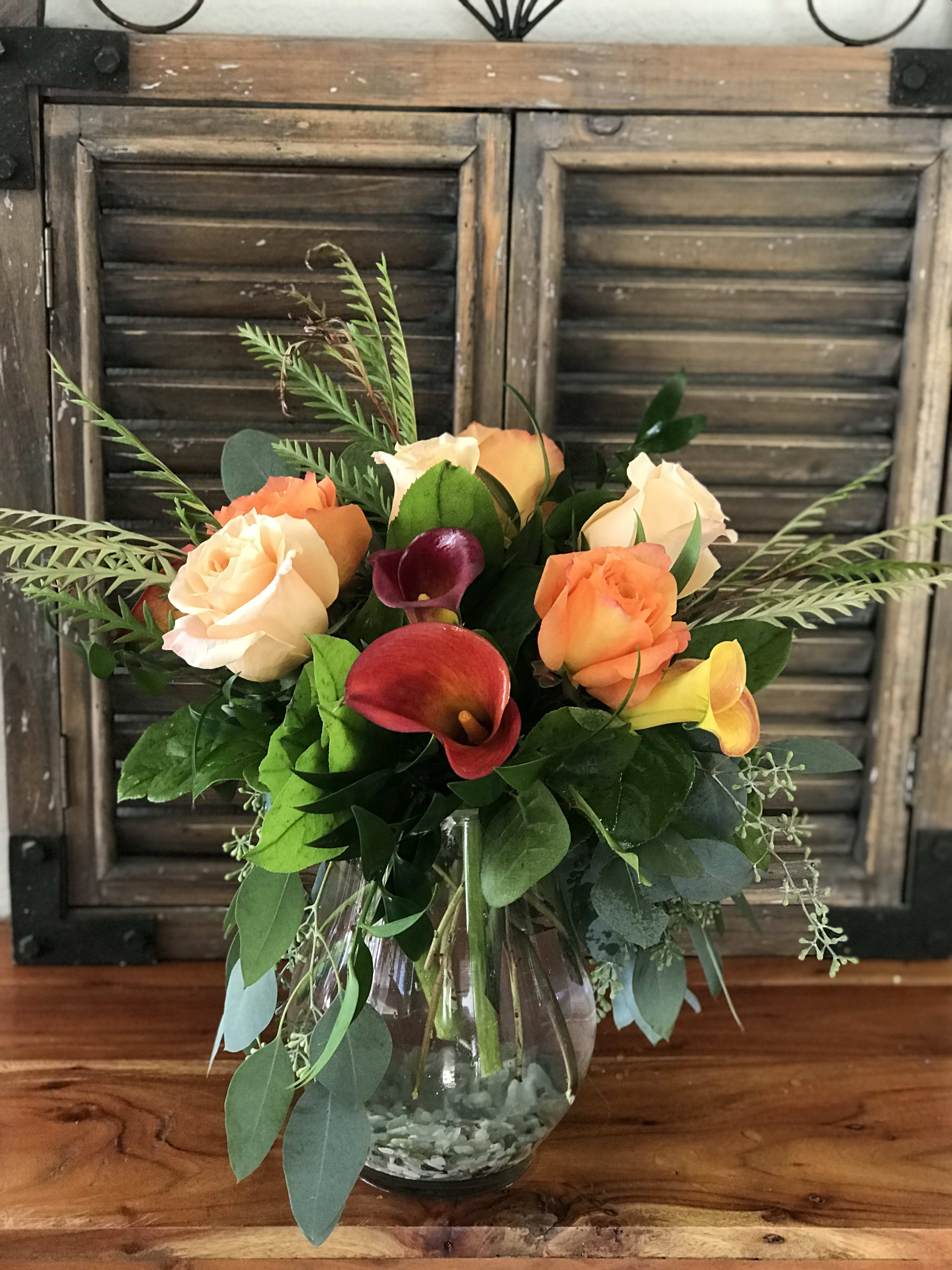 Seaside Fall - Roses and Calla Liles in fall shades create a versatile autumn themed bouquet. Cut fresh and made to order. 