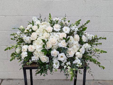 White Reflections Casket Spray White Reflections Casket Spray - A lovely casket spray in all white flowers.