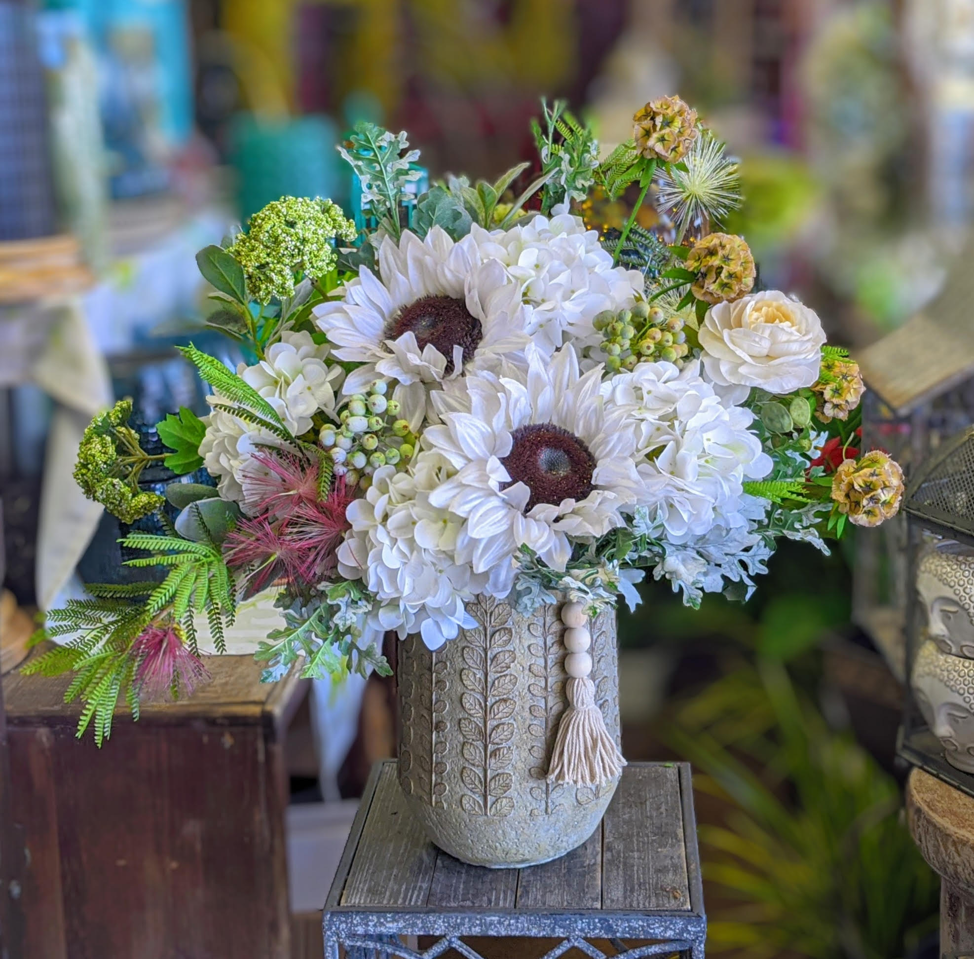 Faux White Sunflower Arrangement - An artificial mixed arrangement in white. Please note, this is not a fresh arrangement, it is artificial.