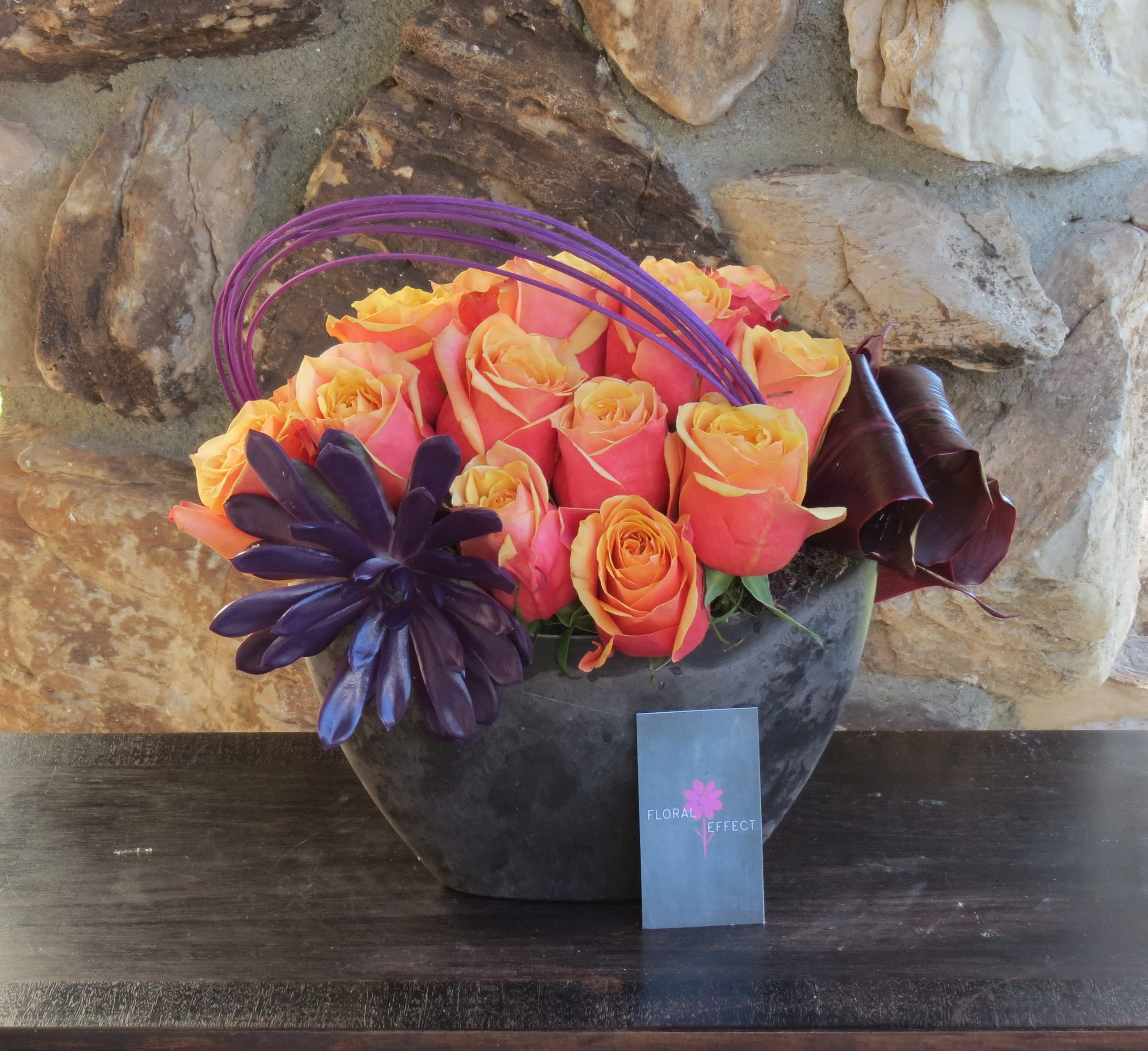 Burnt orange roses Burnt orange roses - orange roses and succulent