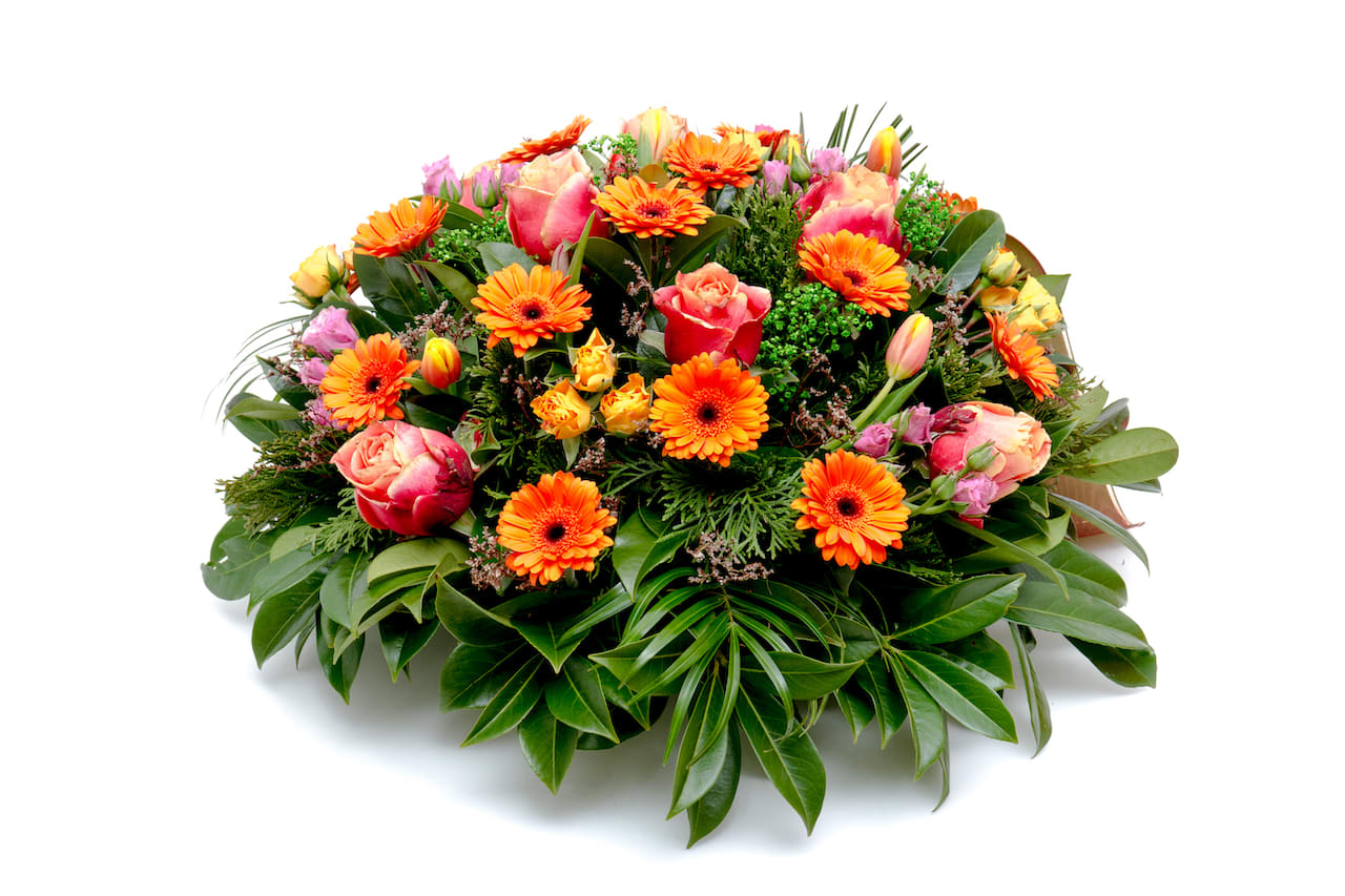 Sympathy Floral  - A sympathy floral wreath is a heartfelt expression of condolence and support during a difficult time. Crafted with care and compassion, this beautiful wreath combines a harmonious blend of soothing colors and delicate blooms to convey your deepest sympathy and offer comfort to those in mourning. It serves as a symbol of remembrance and a gesture of solace, bringing a touch of natural beauty to the somber atmosphere of a memorial service or funeral, honoring the memory of a loved one with grace and compassion.