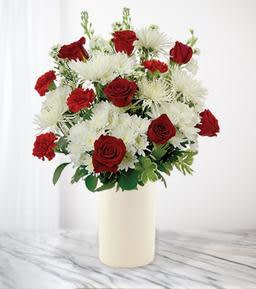 Cherished moments red &amp; white - Cherished moments transmits an elegant sentiment of fondness and affection with it's traditional shades of red, exquisite white blooms and more. The vase will vary.