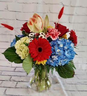 Sunsational florals Sunsational florals - This floral arrangement has a little bit of everything...color, texture and natural beauty!